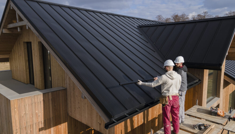 full-shot-roofers-working-together-with-helmets