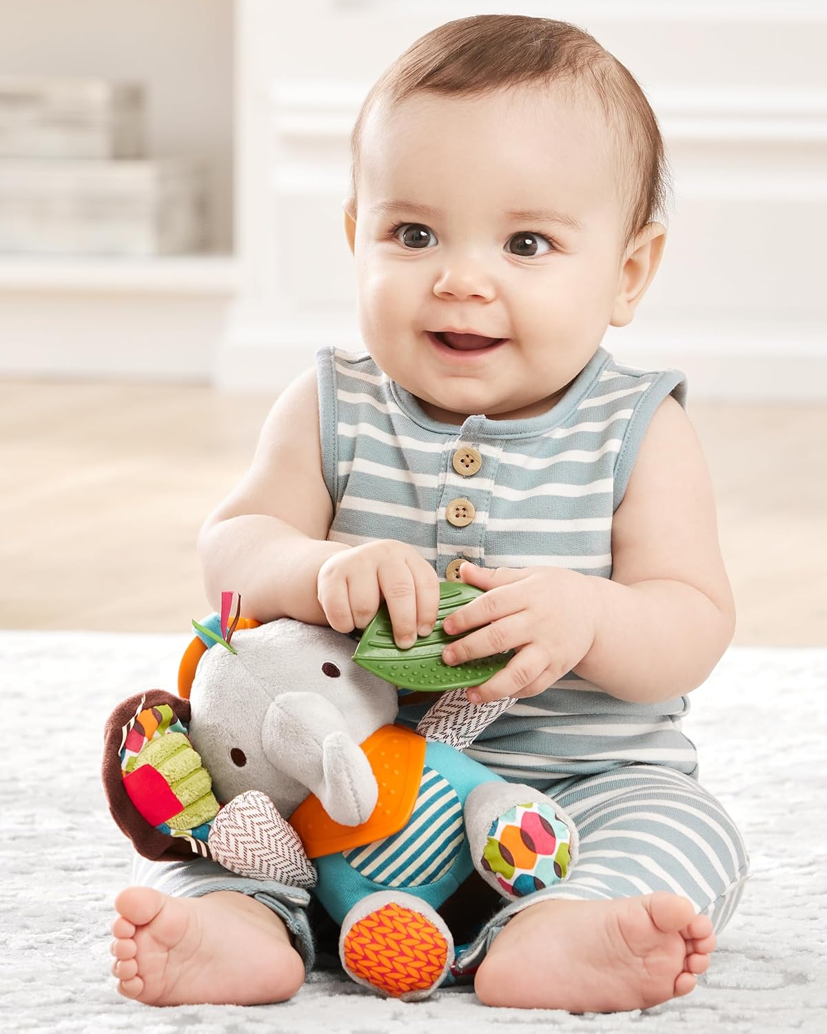 1759777219_Skip-Hop-Bandana-Buddies-Baby-Activity-and-Teething-Toy-with-Multi-Sensory-Rattle-and-Textures-Elephant.jpg Skip Hop Bandana Buddies Baby Activity and Teething Toy with Multi-Sensory Rattle and Textures, Elephant - Image 4