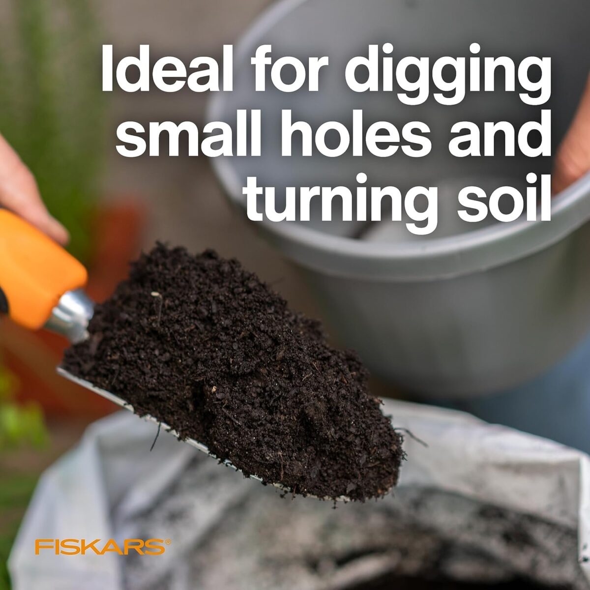 Fiskars Ergo Garden Trowel for Digging and Planting, Heavy Duty Gardening Hand Tool with Hanging Hole - Image 3