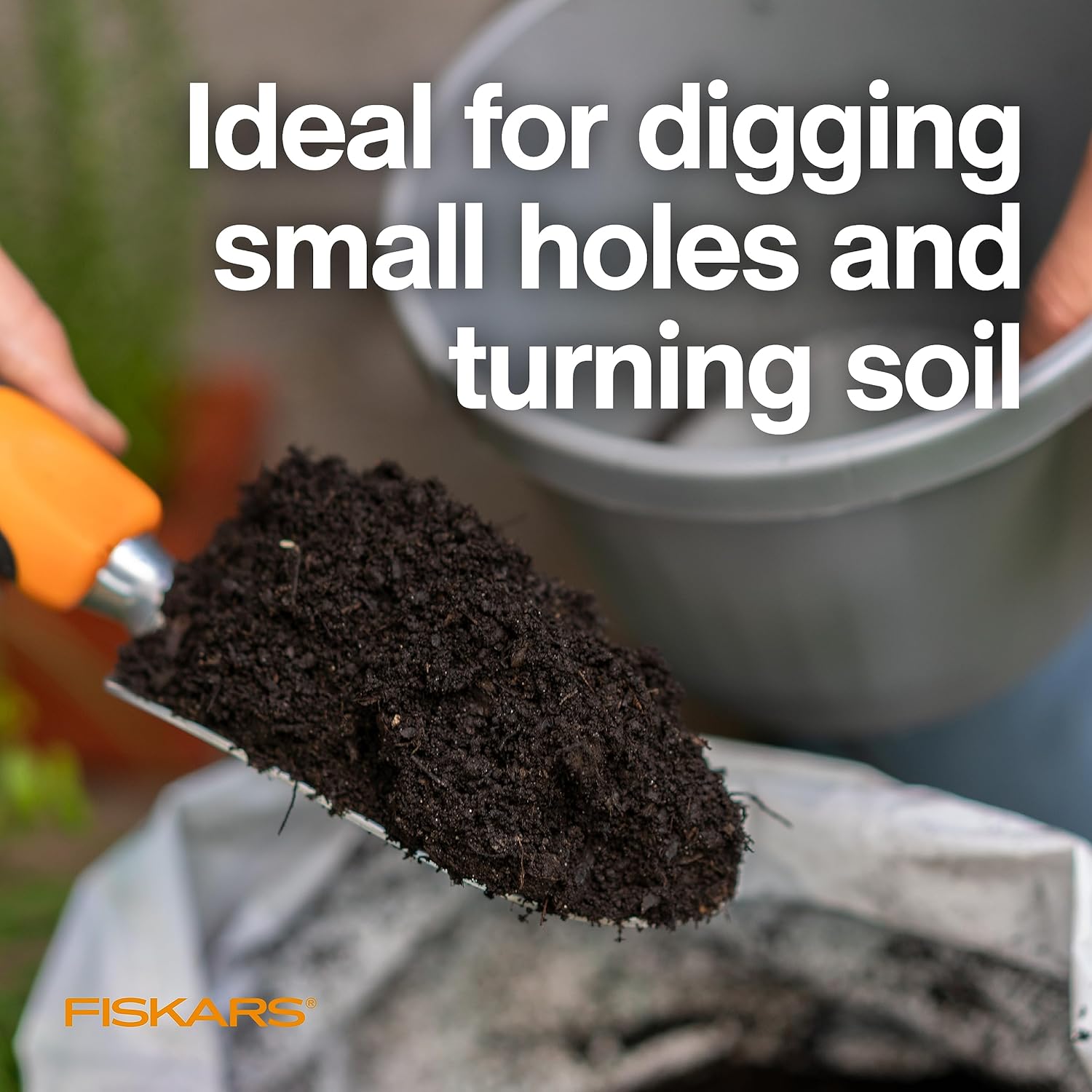 1759994549_Fiskars-Ergo-Garden-Trowel-for-Digging-and-Planting-Heavy-Duty-Gardening-Hand-Tool-with-Hanging-Hole.jpg Fiskars Ergo Garden Trowel for Digging and Planting, Heavy Duty Gardening Hand Tool with Hanging Hole - Image 3