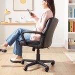 Amazon Basics Office Computer Task Desk Chair with Padded Armrests, Mid-Back, Adjustable, 360 Swivel, Rolling, 275 Pound Capacity, 24.2"D x 24"W x 34.8"H, Black Faux Leather - Image 3