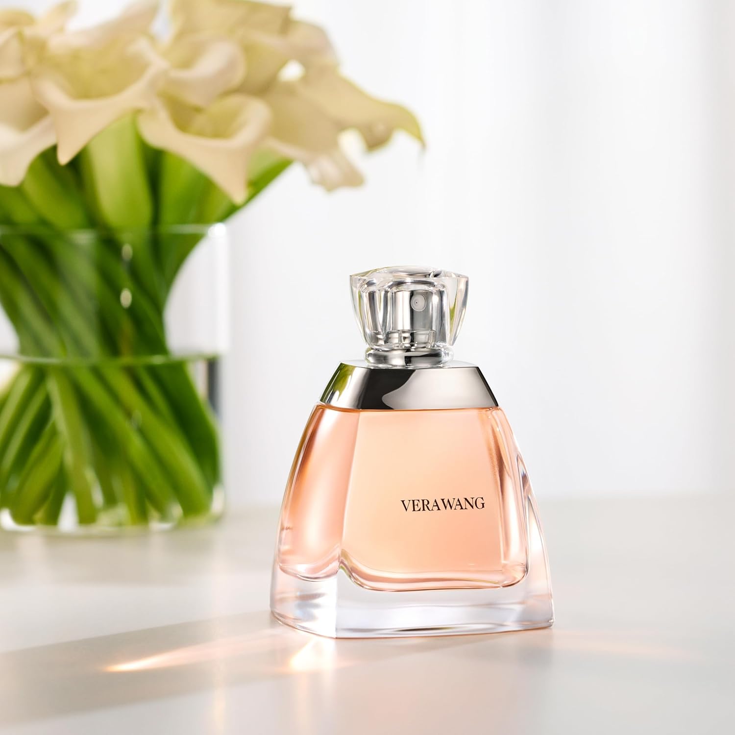 1761120349_Vera-Wang-Eau-de-Parfum-for-Women-Delicate-Floral-Scent-Notes-of-Iris-Lillies-Sandalwood-Feminine-Subtle-3.4-Fl-Oz.jpg Vera Wang Eau de Parfum for Women - Delicate, Floral Scent - Notes of Iris, Lillies, & Sandalwood - Feminine & Subtle - 3.4 Fl Oz - Image 8