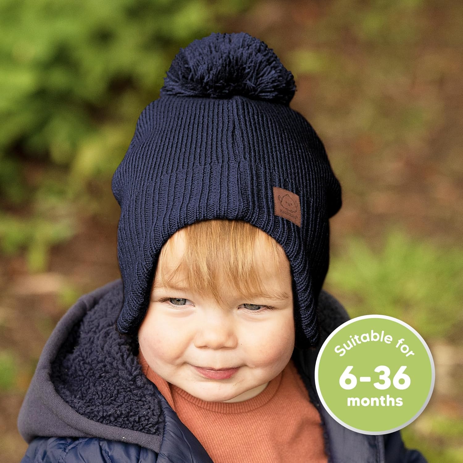 1761473000_Baby-Beanies-Baby-Hats-for-Boys-Girls-Cute-Toddler-Winter-Hat-Soft-Stretchy-Beanies-for-Infant-Newborn-6-36-Months-Cozy-Warm-with-Earflap-Muff-Pom-Navy.jpg Baby Beanies, Baby Hats for Boys, Girls - Cute Toddler Winter Hat, Soft & Stretchy Beanies for Infant, Newborn 6-36 Months, Cozy & Warm with Earflap Muff & Pom (Navy) - Image 3