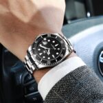 OLEVS Men's Stainless Steel Watch, Big Face Easy to Read Analog Quartz Dress Watches, Classic Rotating Bezel Waterproof Luminous Hands Date Mens Wristwatch - Image 4